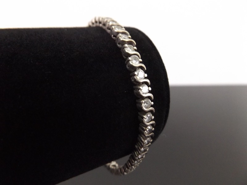 lot 36 image: .925 Sterling Silver Faceted Crystal Bracelet