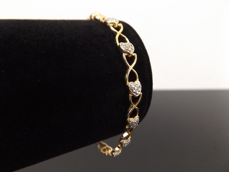 lot 39 image: .925 Sterling Silver Diamond Accented Infinite Heart Vermeil Bracelet