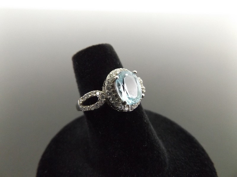 lot 47 image: .925 Sterling Silver Faceted Topaz Ring Size 5