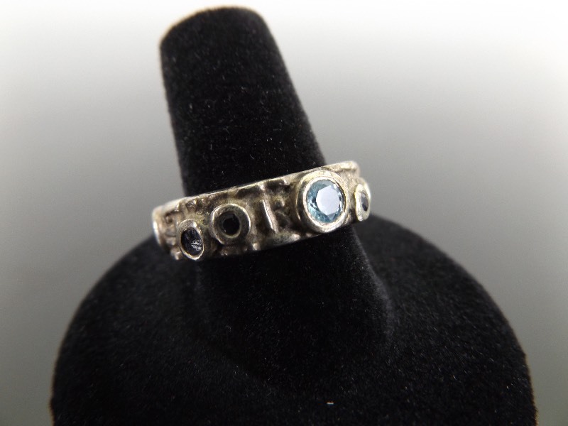 lot 49 image: .925 Sterling Silver Topaz and Amethyst Ring Size 8