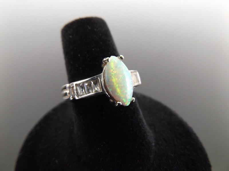 lot 57 image: .925 Sterling Silver Opal Ring Size 6.5