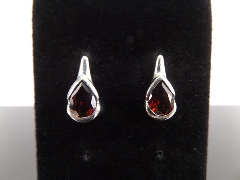 lot 69 image: .925 Sterling Silver Pear Cut Garnet Post Earrings