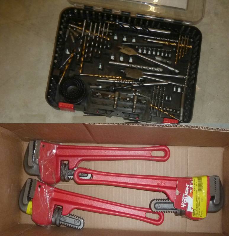 3 pipe wrenches and a drill bit set...