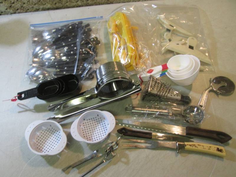Set of Silverware and Misc other Ki...