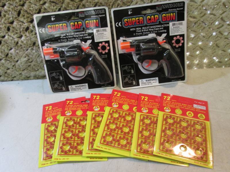 2 Super Cap Guns and 6 Packs of Cap...