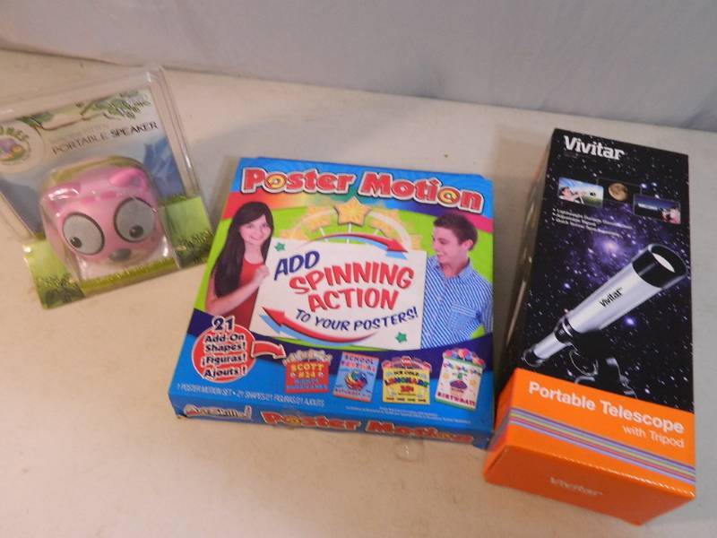 lot 140 image: New Portable Telescope, New Portable Speaker, and More
