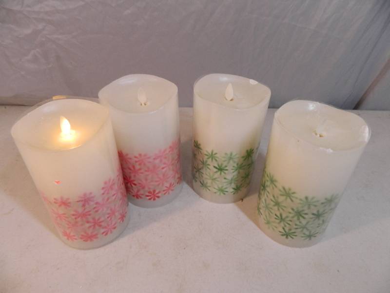 lot 162 image: 4 Luminara Flameless Candles with Remote