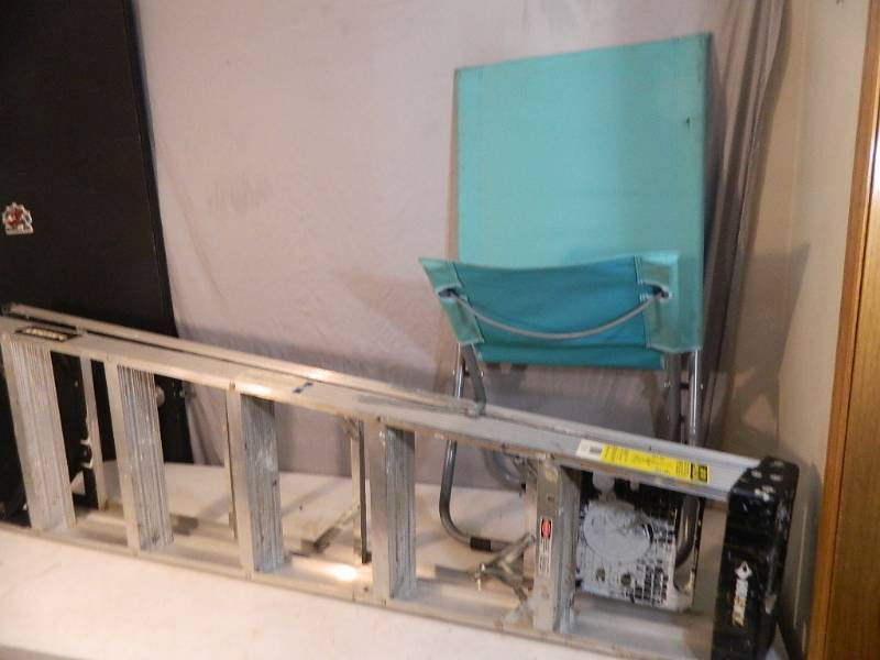 lot 204 image: 6 ft Step Ladder, Lawn Chair