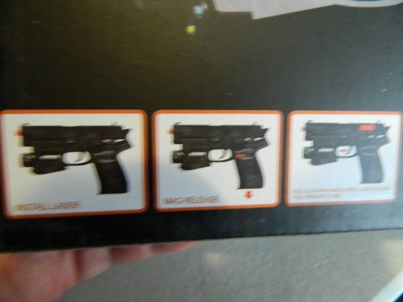 lot 69 image: New Air Soft Pistol
