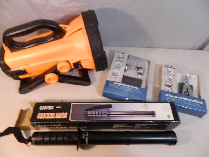 lot 71 image: New Multi-Tool, Shocker Baton, and More