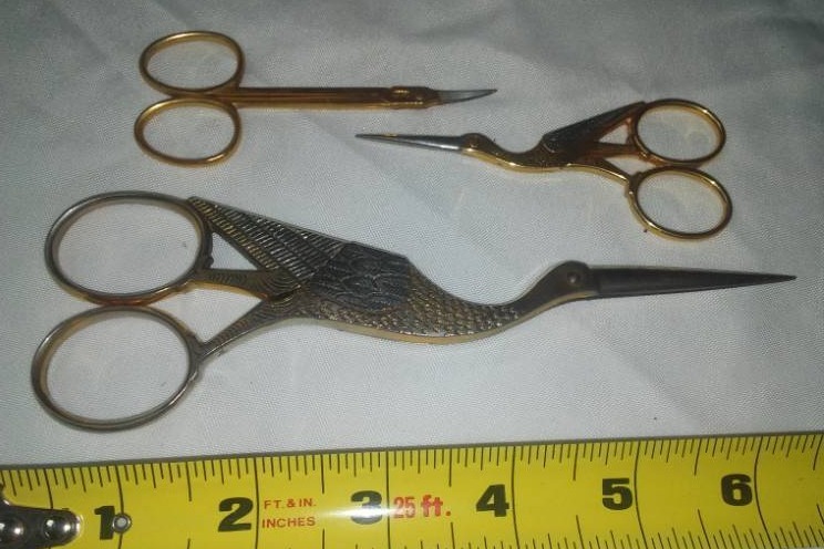 lot 55 image: Embroidery Scissors.