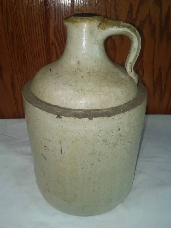 lot 90 image: I gallon Crock Jug with plug.