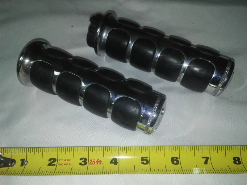 lot 152 image: Motorcycle handlebar grips.