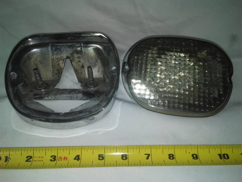 lot 157 image: Motorcycle light assembly no cracks on lens.