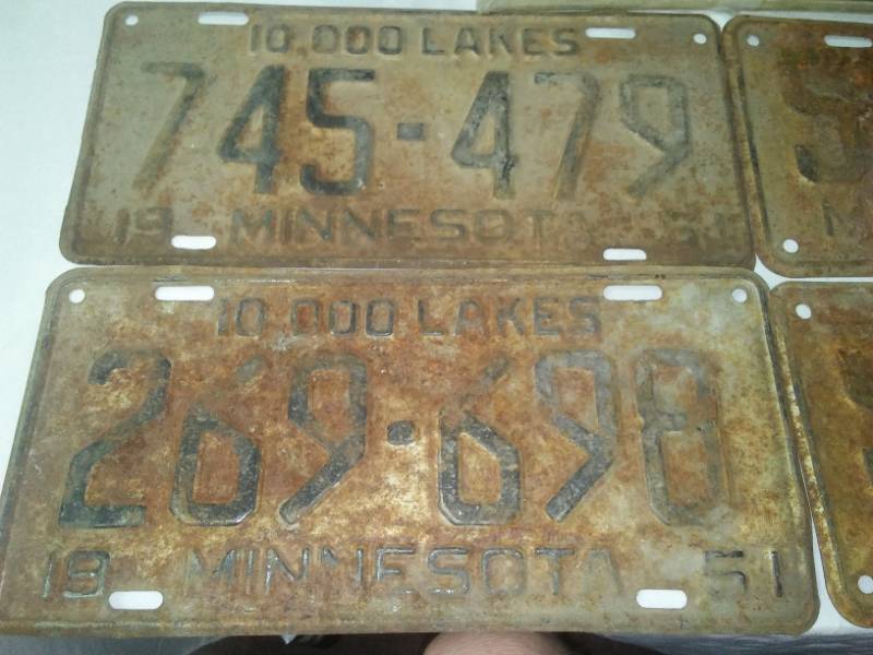 lot 241 image: Automotive Collectibles license plates and Pontiac