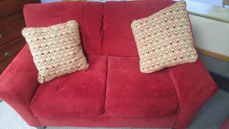 lot 301 image: Red Love Seat sofa.