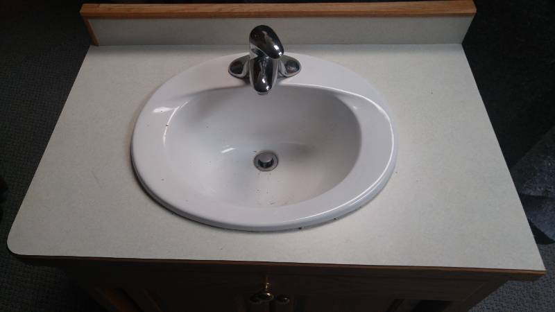 lot 305 image: Bathroom vanity. With Moen faucet.