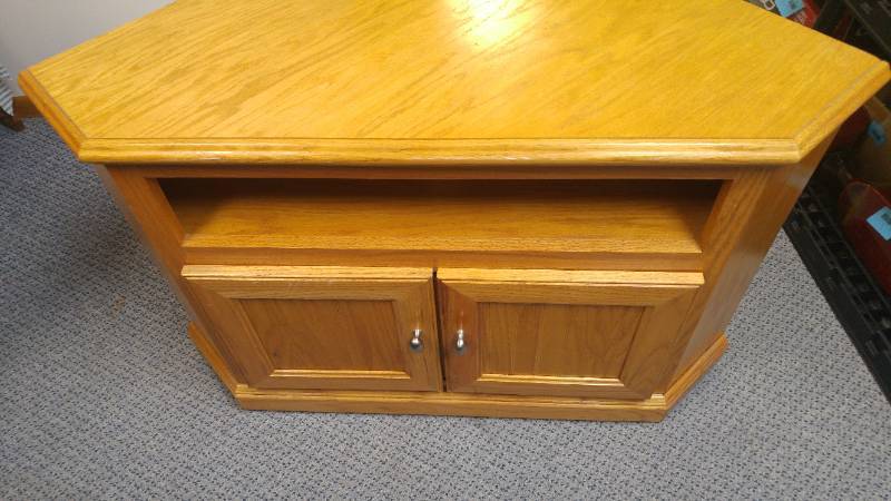 lot 309 image: Corner TV cabinet. Solid oak.