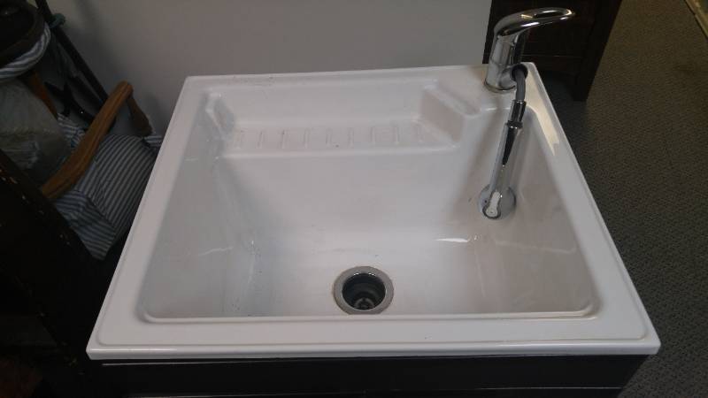 lot 310 image: Utility sink w cabinet.