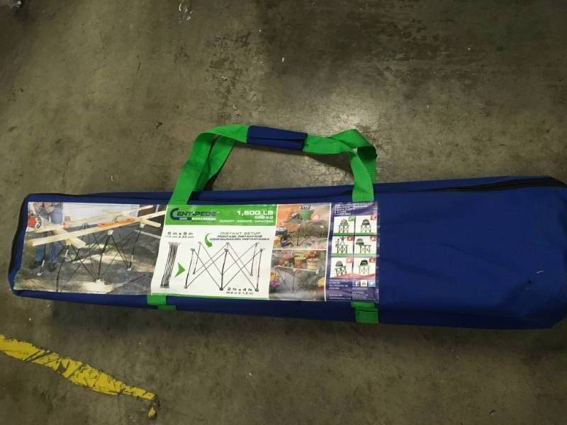 lot 61 image: Portable Work System 30.5 in. Compacting 2 ft. x 4 ft. Sawhorse- not used