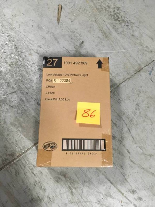 lot 86 image: (Lot of 2) Hampton Bay Low-Voltage 10-Watt Aged Brass Outdoor Halogen Landscape Path Light- not used