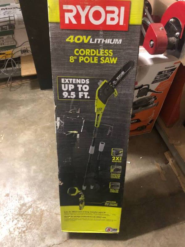 lot 302 image: RYOBI 8 in. 40-Volt Lithium-Ion Cordless Pole Saw, 2 Ah Battery and Charger Included not used