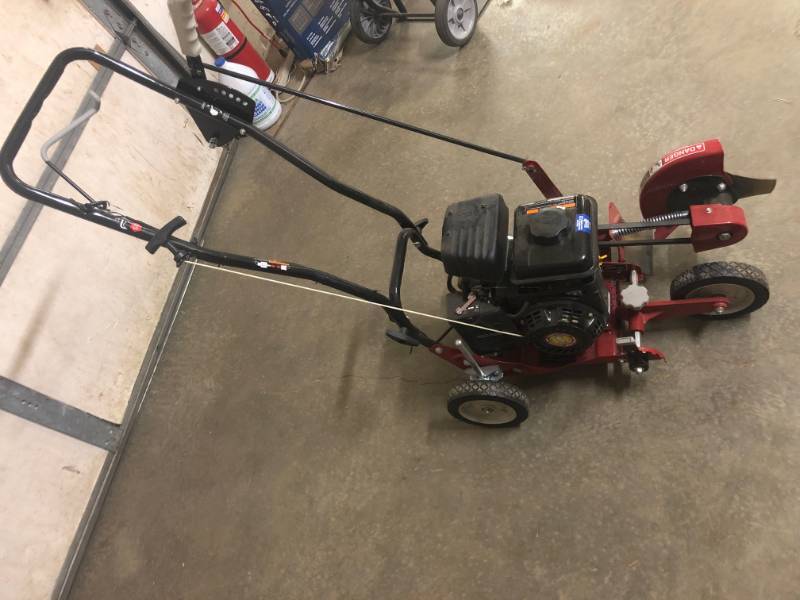 lot 303 image: Southland 9 in. 79cc Gas Walk-Behind Edger with Curb Hopping Feature- used