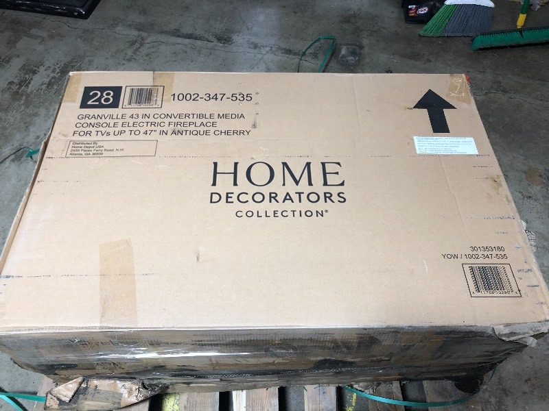 lot 314 image: Home Decorators Collection Granville 43 in. Convertible Mantel Electric Fireplace in Antique Cherry with Faux Stone Surround not used