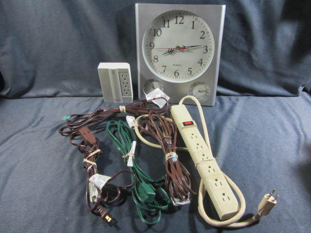 lot 143 image: Clock, Power Strip, Cords