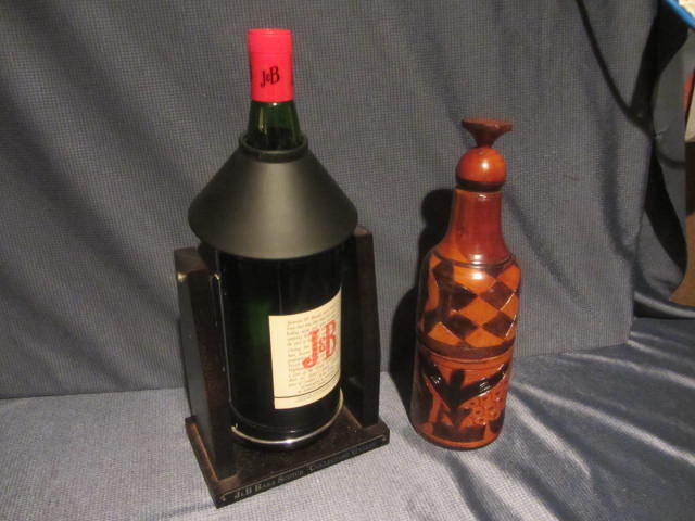 lot 211 image: Carved Bottle, Tipper Bottle