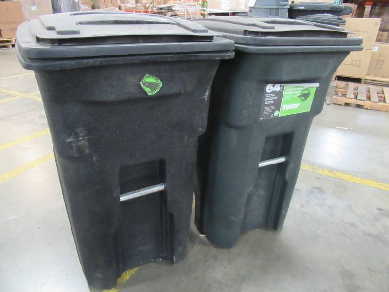 lot 153 image: 2 Toter 64 Gallon Flip Top Trash Cans - USED 1 Can Missing Wheels