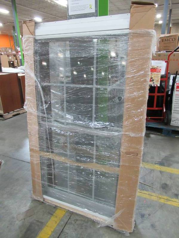 lot 157 image: Custom Vinyl Double Hung Window in White With Internal Grills, Full Screen and Tilting Sashes, 35 12 X 59 14 X 4 916