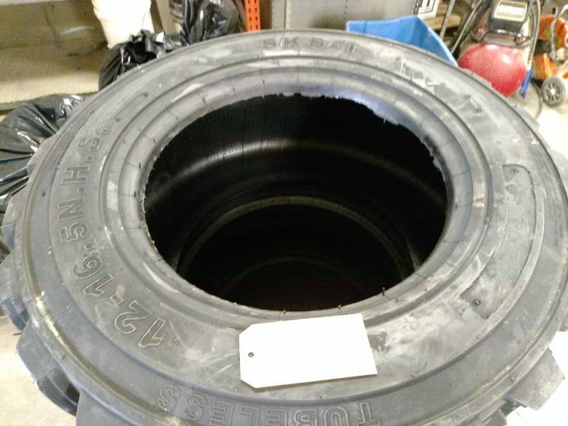 lot 3 image: (4) Haulking Skid Loader Tires