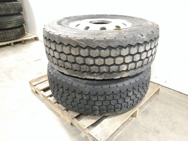 lot 6 image: (2) Truck Tires on Aluminum Rims, B...