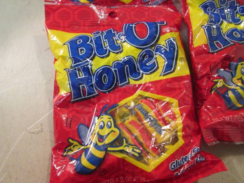 lot 128 image: 12 Assorted Bags of Candy Best by d...