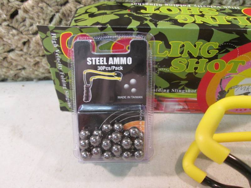 lot 10 image: High Velocity Folding Slingshot with 30-Pack of Steel Ammo All New RM1