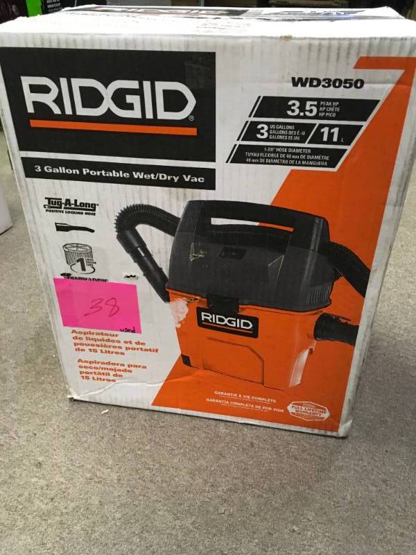 lot 38 image: RIDGID 3 Gal. 3.5-Peak HP Portable Pro WetDry Vacuum  USED