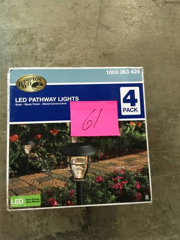 lot 61 image: Hampton Bay Solar Black Outdoor Integrated LED 3000K 10-Lumens Landscape Pathway Light (4-Pack)- good condition