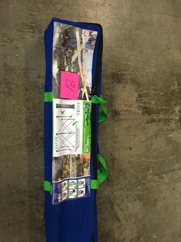 lot 81 image: Portable Work System 30.5 in. Compacting 2 ft. x 4 ft. Sawhorse- not used