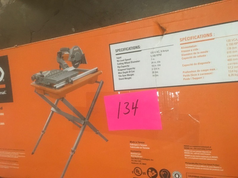 lot 134 image: RIDGID 9 Amp Corded 7 in. Wet Tile Saw with Stand- open box