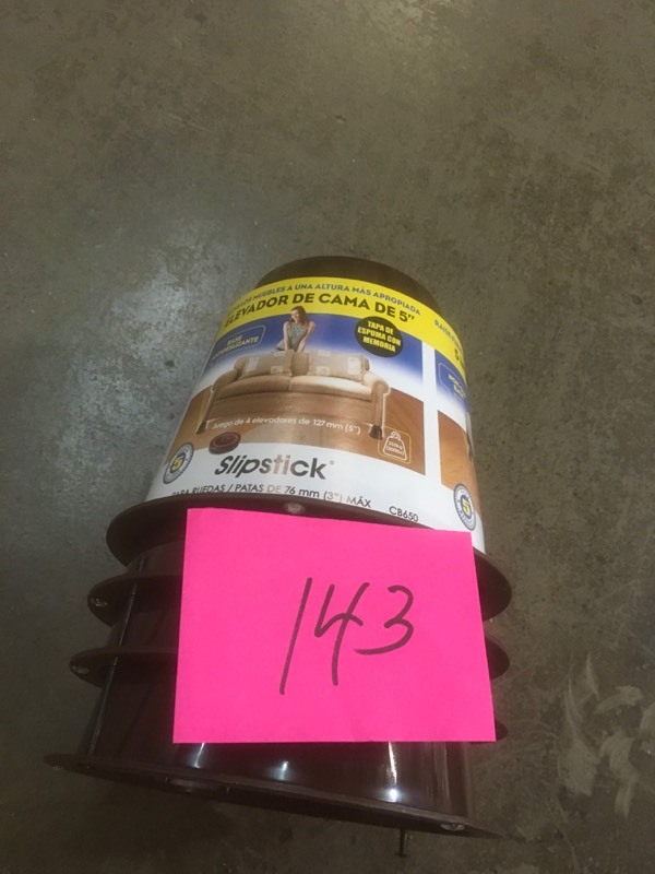 lot 143 image: SlipStick 5 in. Extra Storage Under-Bed Risers Chocolate (Set of 4)- not used