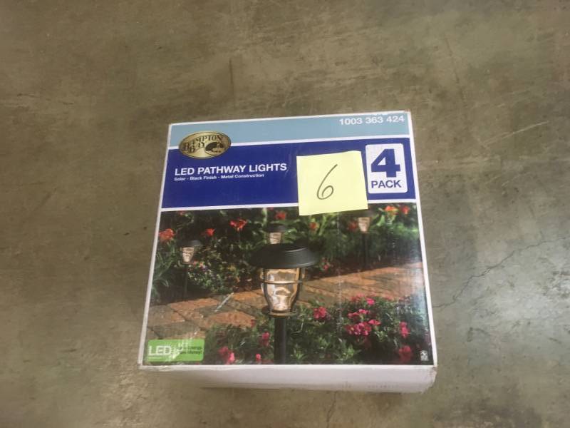lot 6 image: Hampton Bay Solar Black Outdoor Integrated LED 3000K 10-Lumens Landscape Pathway Light (4-Pack)- not used