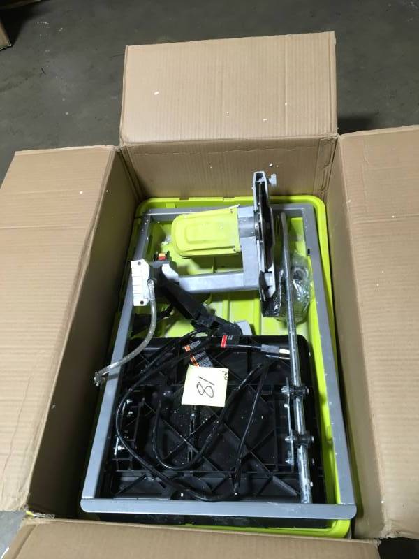 lot 81 image: RYOBI 9 Amp Corded 7 in. Overhead Wet Tile Saw  USED