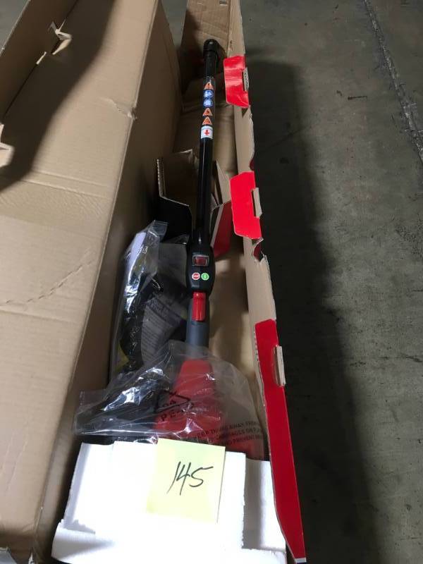 lot 145 image: Toro 2-Cycle 25.4cc Attachment Capable Curved Shaft Gas String Trimmer- good condition