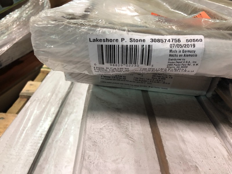 lot 159 image: Lot of 6 cases of Lakeshore Pecan Stone 7 mm Thick x 7-23 in. Wide x 50-58 in. Length Laminate Flooring (24.17 sq. ft.  case)