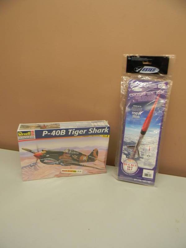 lot 47 image: ESTES CROSSFIRE FLYING MODEL ROCKET KIT - NEW IN PACKAGE & REVELL P-40B TIGER SHARK MODEL 148 SCALE - NEW IN BOX - SEE PICTURES