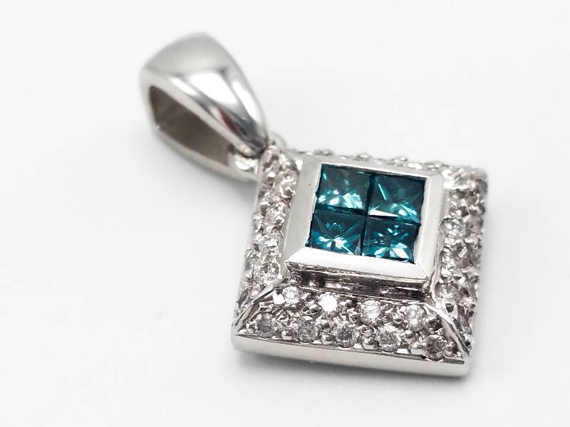 lot 7 image: Impressive 1.12 Carat Blue and White Diamond Estate Pendant in 18k White Gold