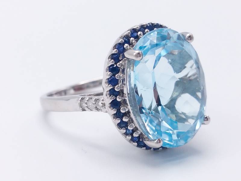 lot 15 image: Stunning, Large Blue Topaz, Natural Sapphire, and Diamond Estate Ring in 14k White Gold