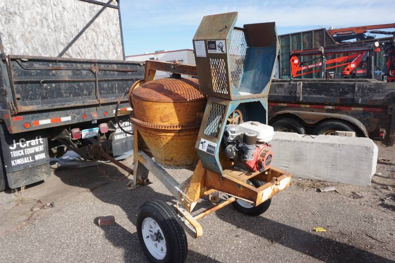 lot 26 image: Stone Tow Behind Gas Powered Commercial Cement Mixer