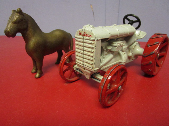 lot 350 image: VINTAGE CAST IRON TOY TRACTOR AND HORSE BANK